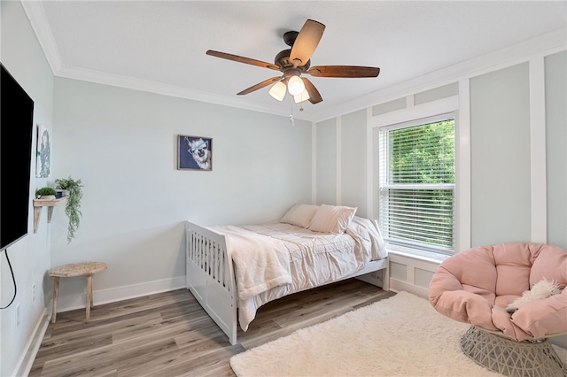 1368 Scroll St, Sebastian, FL 32958 - bedroom with ornamental molding, light wood-style floors, and a ceiling fan