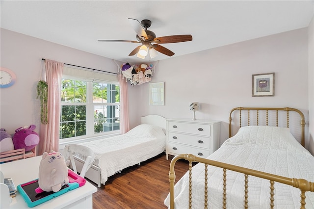 1368 Scroll St, Sebastian, FL 32958 - bedroom featuring wood finished floors and ceiling fan