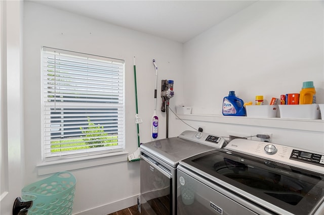 1368 Scroll St, Sebastian, FL 32958 - washroom featuring independent washer and dryer and dark wood finished floors