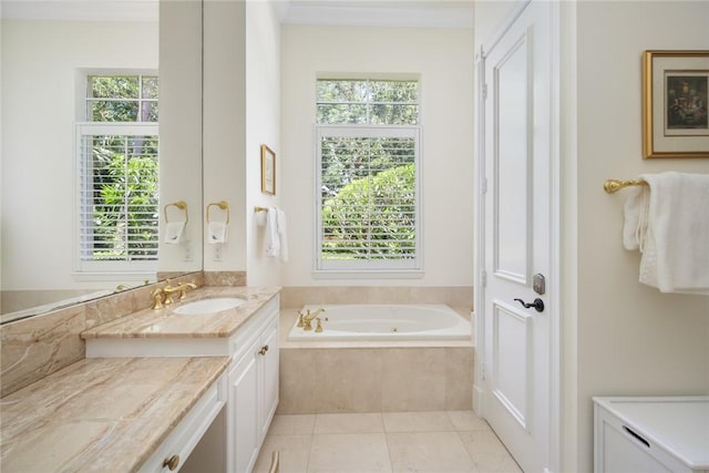 1624 Weybridge Cir, Vero Beach, FL 32963 - bathroom with a whirlpool tub, tile patterned flooring, and vanity