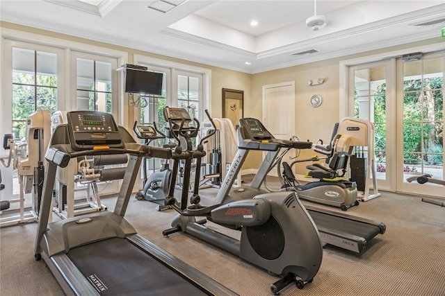 1624 Weybridge Cir, Vero Beach, FL 32963 - exercise room featuring crown molding, french doors, and a healthy amount of sunlight