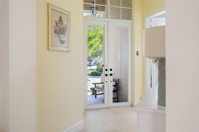 1624 Weybridge Cir, Vero Beach, FL 32963 - entryway with baseboards and tile patterned flooring