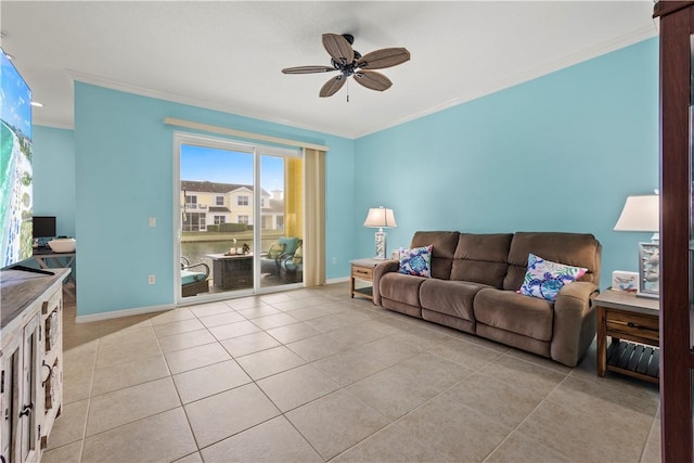 tiled living room with crown molding and ceiling fan