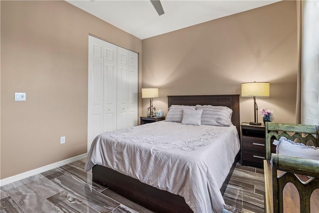 bedroom featuring ceiling fan and a closet