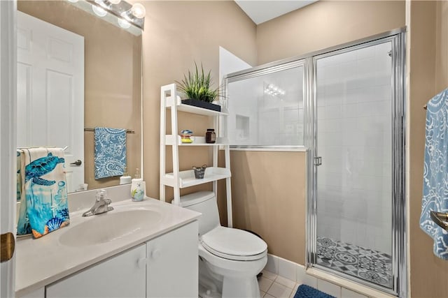 bathroom with walk in shower, vanity, toilet, and tile patterned flooring