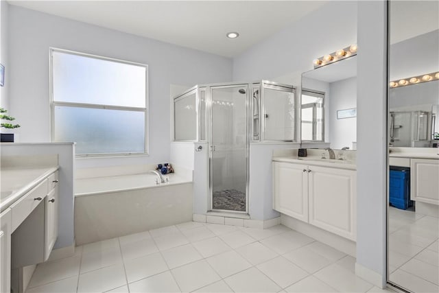 bathroom featuring vanity, separate shower and tub, and tile patterned flooring