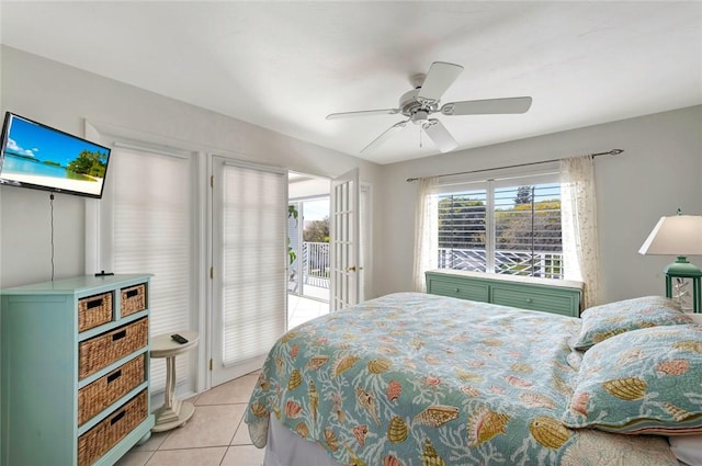 855 Dahlia Ln Unit 304, Vero Beach, FL 32963 - bedroom featuring access to outside, light tile patterned floors, and ceiling fan
