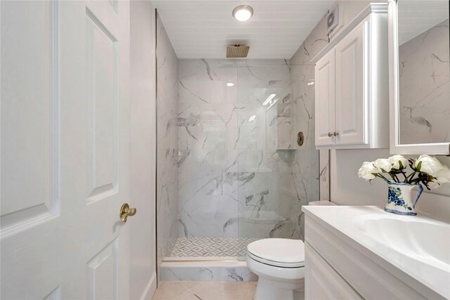 855 Dahlia Ln Unit 304, Vero Beach, FL 32963 - full bath featuring a marble finish shower, vanity, toilet, and marble finish floors