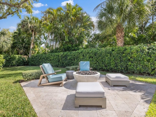 view of patio with an outdoor fire pit