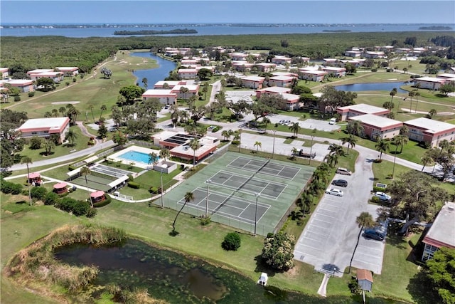 bird's eye view with a water view