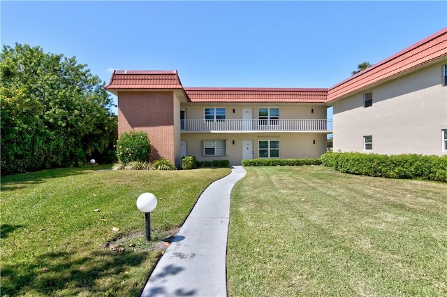 exterior space featuring a front lawn