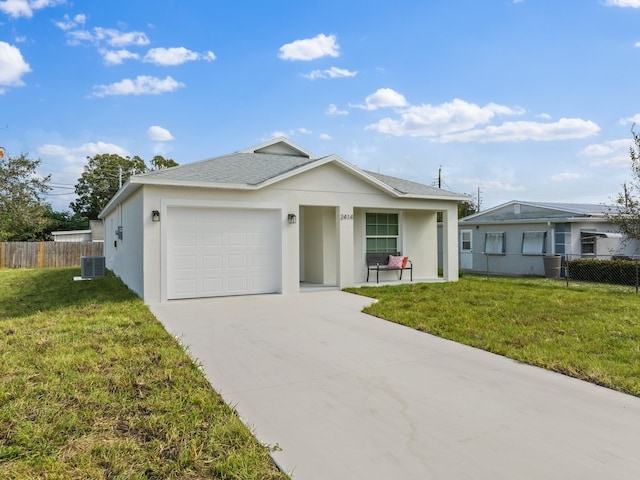 ranch-style house featuring a garage, a front lawn, and central AC