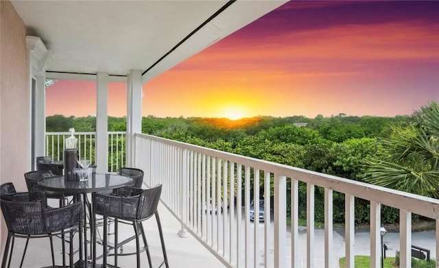 8830 S Sea Oaks Way Unit 301, Vero Beach, FL 32963 - view of balcony at dusk