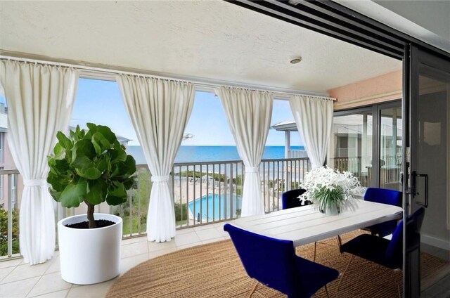 8830 S Sea Oaks Way Unit 301, Vero Beach, FL 32963 - sunroom / solarium with a water view
