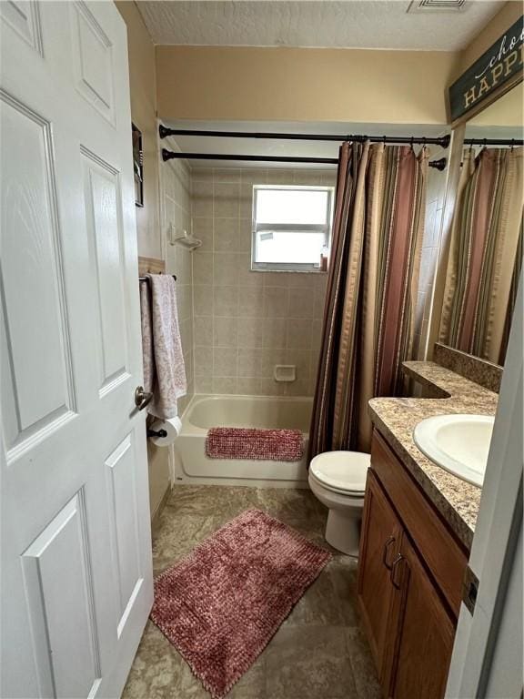 full bathroom featuring toilet, vanity, and shower / tub combo with curtain