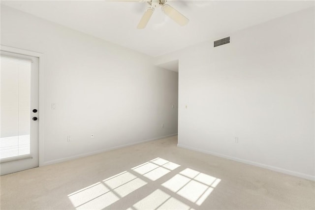 5540 N Harbor Village Dr Unit 103, Vero Beach, FL 32967 - unfurnished room with visible vents, ceiling fan, light colored carpet, and baseboards