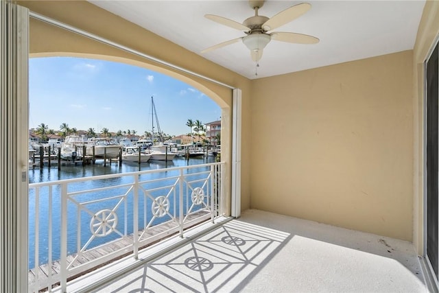 5540 N Harbor Village Dr Unit 103, Vero Beach, FL 32967 - balcony featuring a water view and ceiling fan