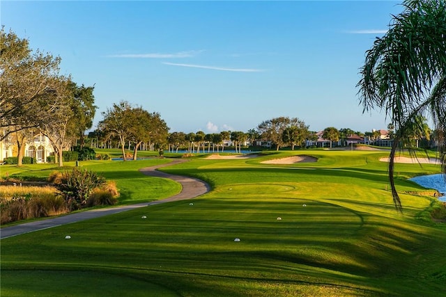 5540 N Harbor Village Dr Unit 103, Vero Beach, FL 32967 - view of home's community with golf course view and a lawn