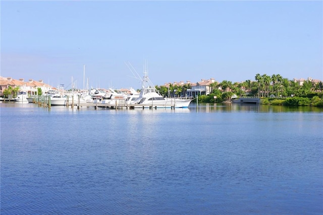 5540 N Harbor Village Dr Unit 103, Vero Beach, FL 32967 - water view featuring a boat dock