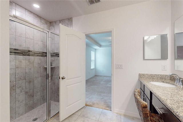 9036 103rd Ave, Vero Beach, FL 32967 - full bath with a stall shower, vanity, tile patterned floors, and recessed lighting