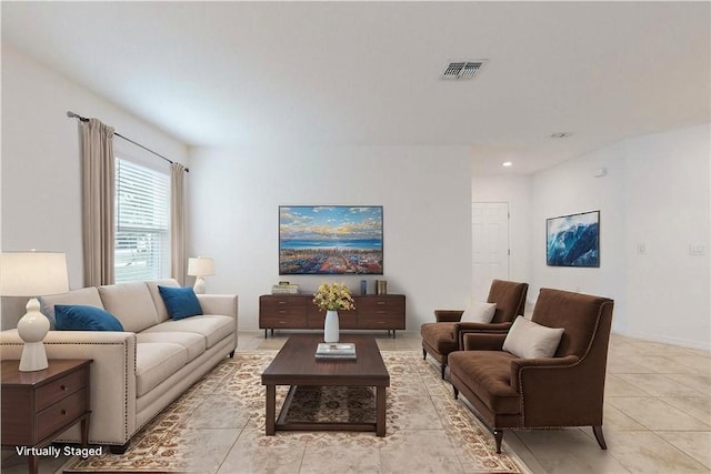 9036 103rd Ave, Vero Beach, FL 32967 - living area with light tile patterned floors and recessed lighting