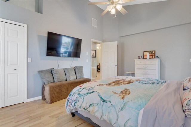 742 Whitmore Dr, Port St Lucie, FL 34984 - bedroom with a high ceiling, wood finished floors, and a ceiling fan