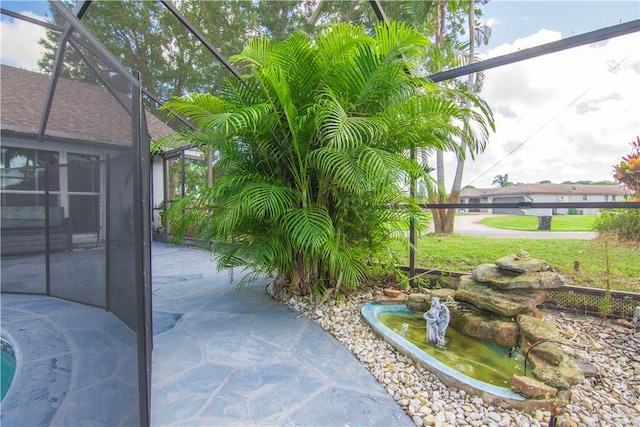 742 Whitmore Dr, Port St Lucie, FL 34984 - view of patio featuring glass enclosure