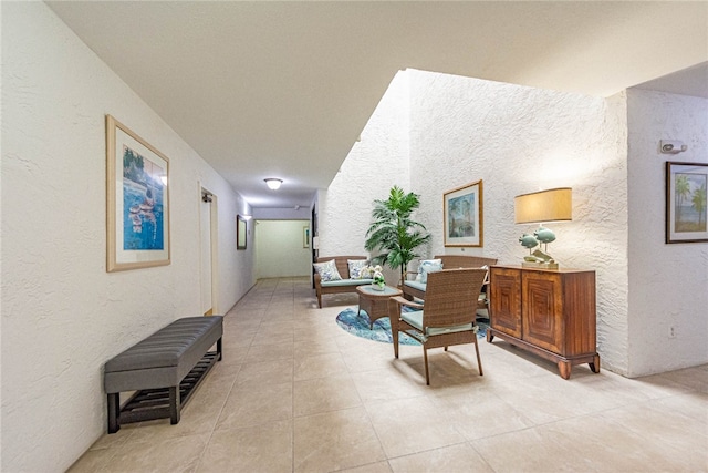 hall with light tile patterned flooring