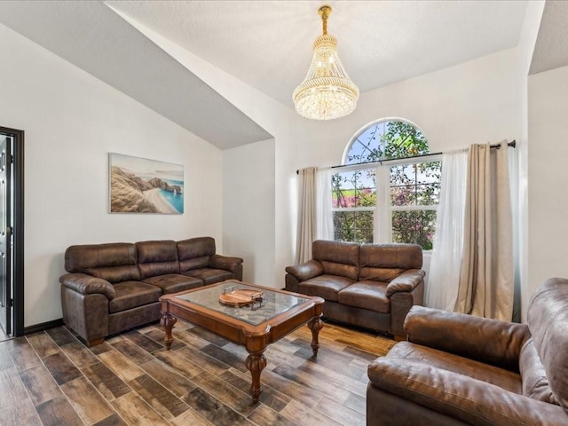 living area with a chandelier, dark wood-style floors, and lofted ceiling