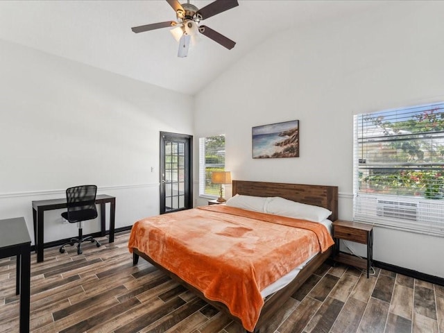 bedroom with multiple windows, wood finished floors, high vaulted ceiling, baseboards, and ceiling fan