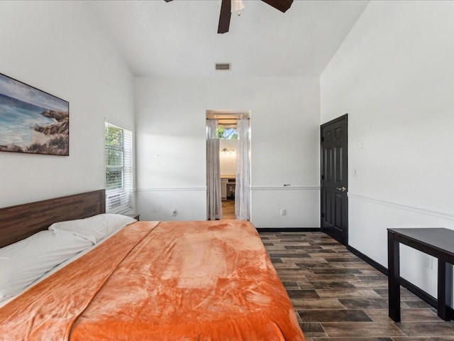 bedroom featuring dark wood-style floors and a ceiling fan