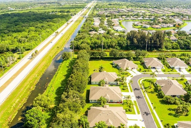 413 W Tangerine Sq SW, Vero Beach, FL 32968 - aerial view of residential area featuring a nearby body of water