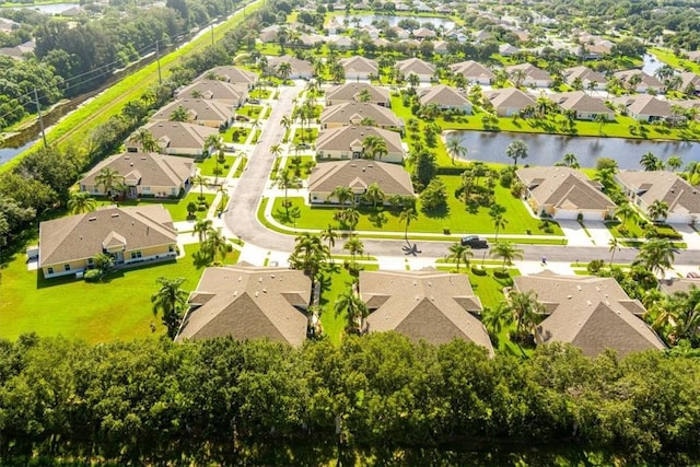 413 W Tangerine Sq SW, Vero Beach, FL 32968 - aerial perspective of suburban area featuring a large body of water