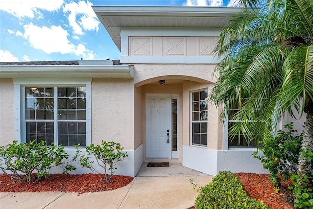 413 W Tangerine Sq SW, Vero Beach, FL 32968 - view of exterior entry with stucco siding