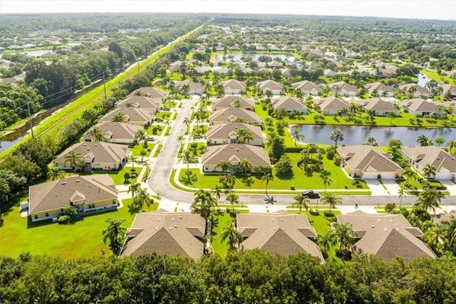 413 W Tangerine Sq SW, Vero Beach, FL 32968 - aerial view of residential area with a large body of water