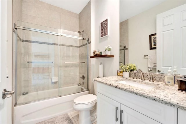 5950 Bella Rosa Ln, Vero Beach, FL 32966 - bathroom with vanity, bath / shower combo with glass door, and tile patterned floors