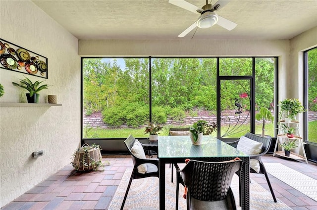 5950 Bella Rosa Ln, Vero Beach, FL 32966 - sunroom / solarium with a ceiling fan and outdoor dining area