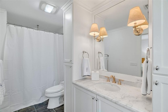 bathroom with crown molding, vanity, toilet, and tile patterned flooring