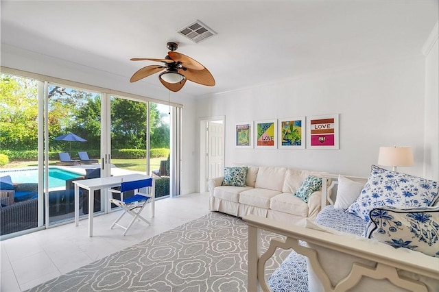 sunroom / solarium with ceiling fan