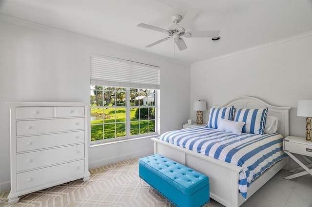 bedroom with crown molding and ceiling fan