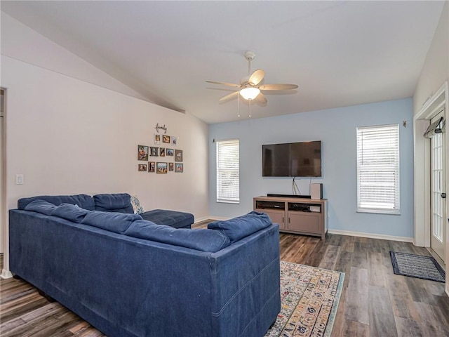 living room featuring ceiling fan, lofted ceiling, and dark hardwood / wood-style flooring