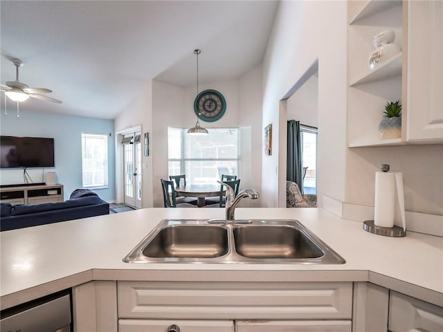 kitchen featuring sink, a wealth of natural light, white cabinets, and ceiling fan