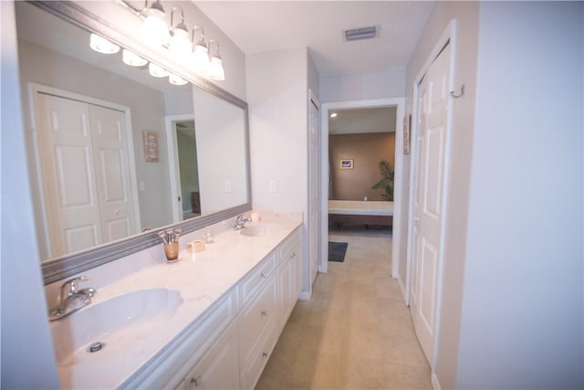 1018 Persian Ln, Sebastian, FL 32958 - ensuite bathroom featuring double vanity