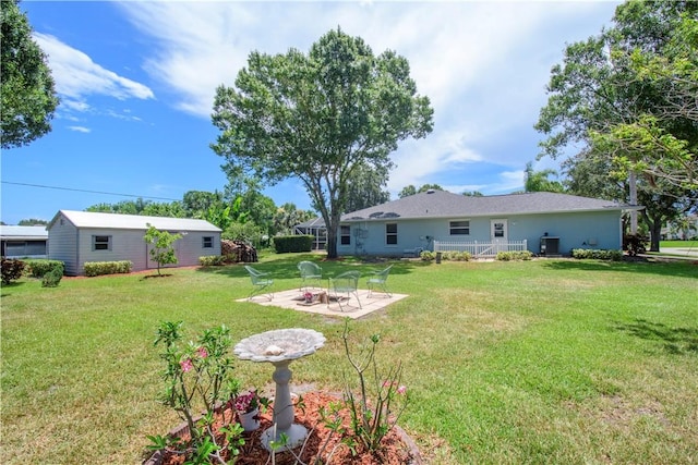 1018 Persian Ln, Sebastian, FL 32958 - view of green lawn with a patio area