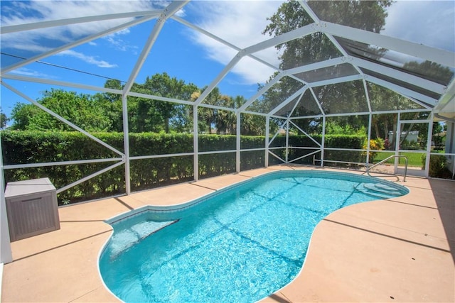 1018 Persian Ln, Sebastian, FL 32958 - outdoor pool featuring a patio area and glass enclosure