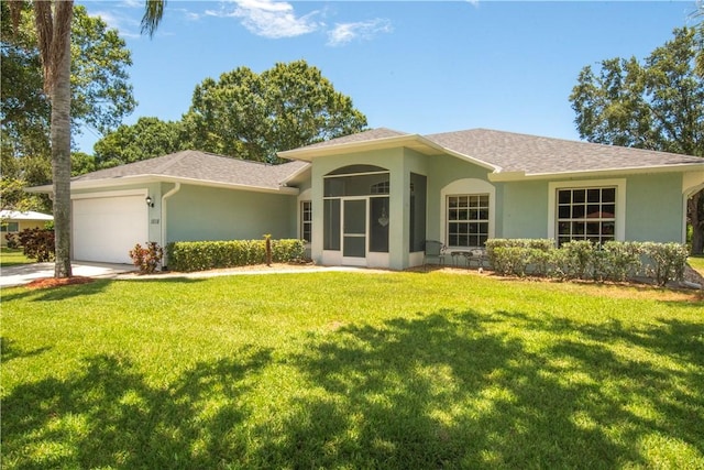 1018 Persian Ln, Sebastian, FL 32958 - single story home with a garage, stucco siding, and a front lawn