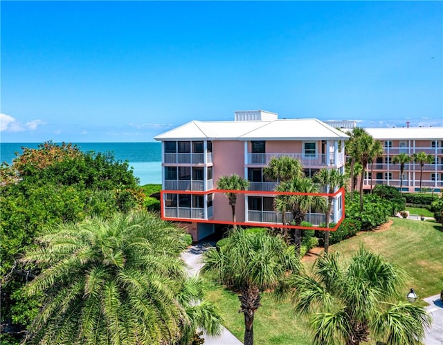 drone / aerial view featuring a water view