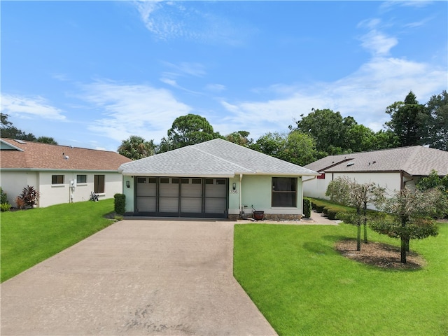 single story home with a front yard and a garage