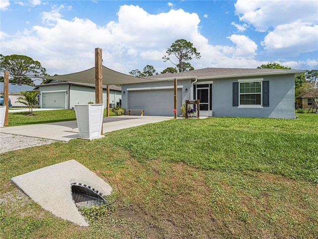 ranch-style home with a garage, a front lawn, concrete driveway, and stucco siding