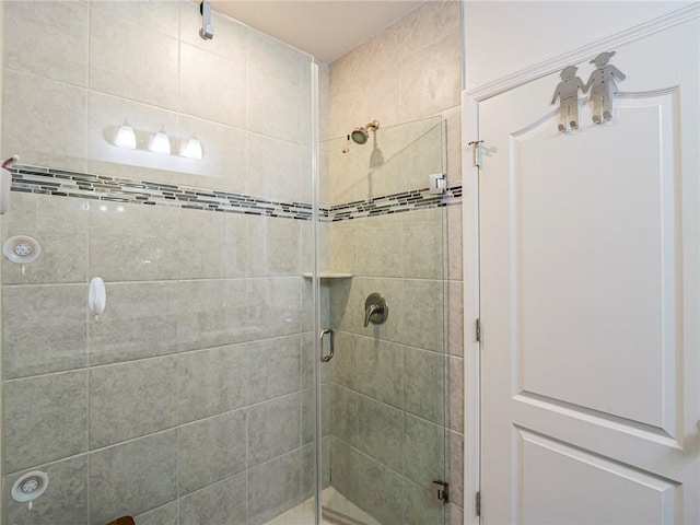 full bathroom with a shower stall